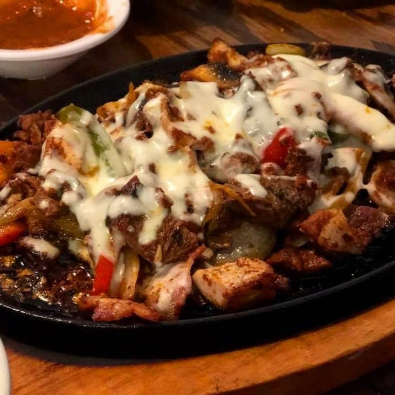 Indulge in Our Lengua Tacos